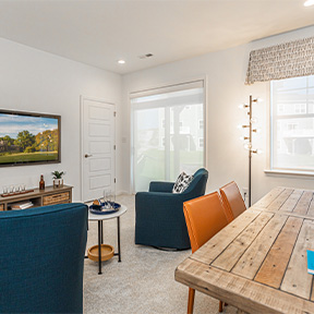 Flex room available in the Jordan model with carpeting and seating area.