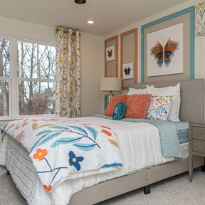 Bedroom with large windows at the new construction luxury homes in Ivyland PA