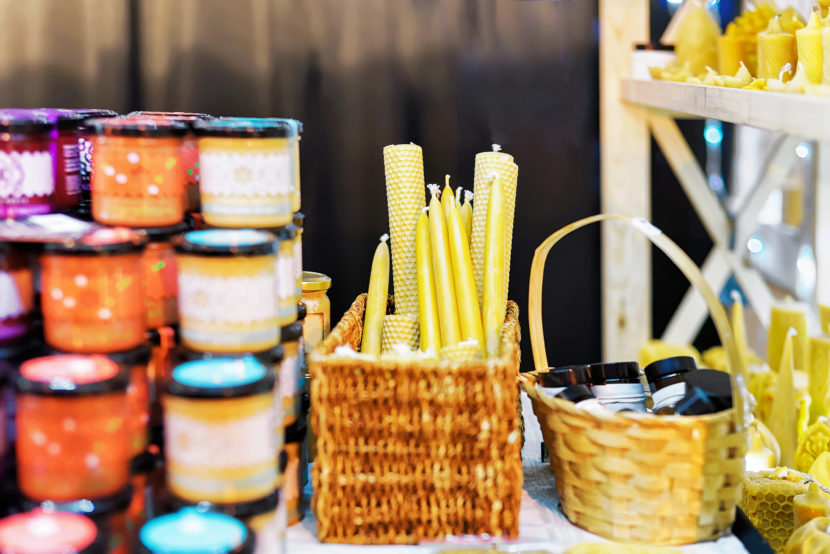 Stall with festive wax candles at a Market.