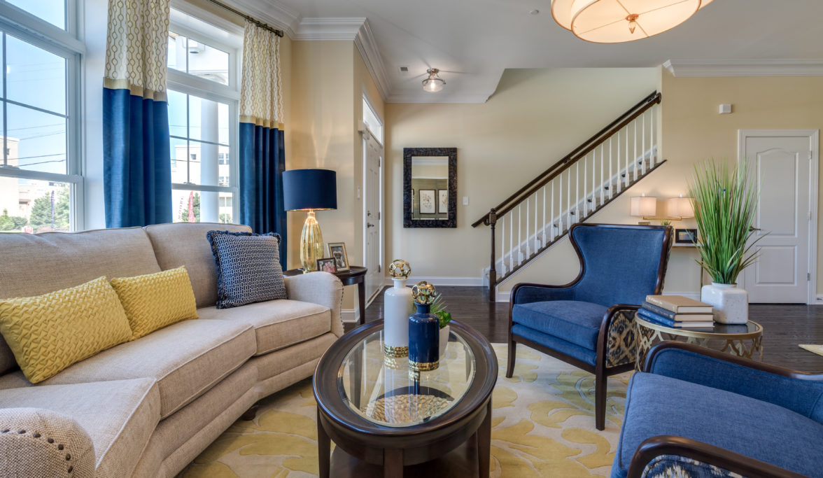 Wrap around couch in model townhome at Siena Place in Philadelphia, PA