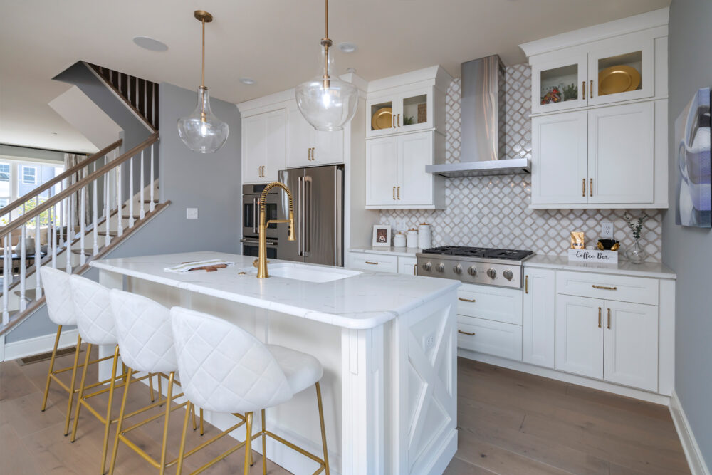 Spacious kitchen with breakfast bar and stainless steel appliances at a Pennsylvania townhome